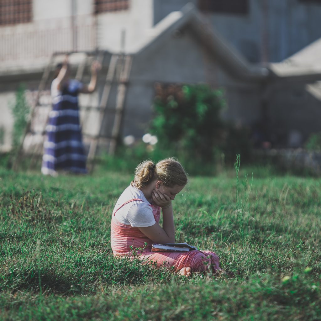 Here is a girl praying for Haiti